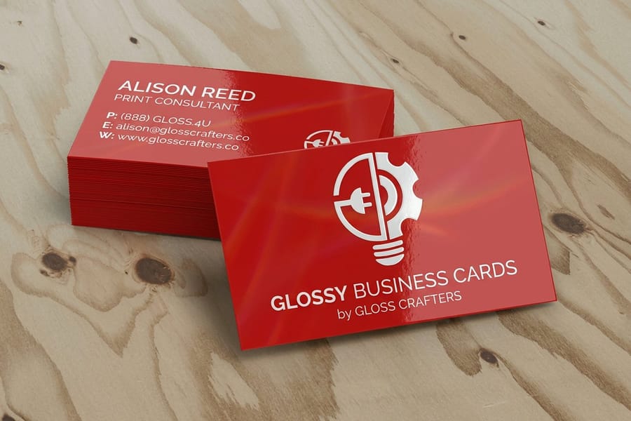 Glossy business cards with vivid color, printed by 4OVER4
