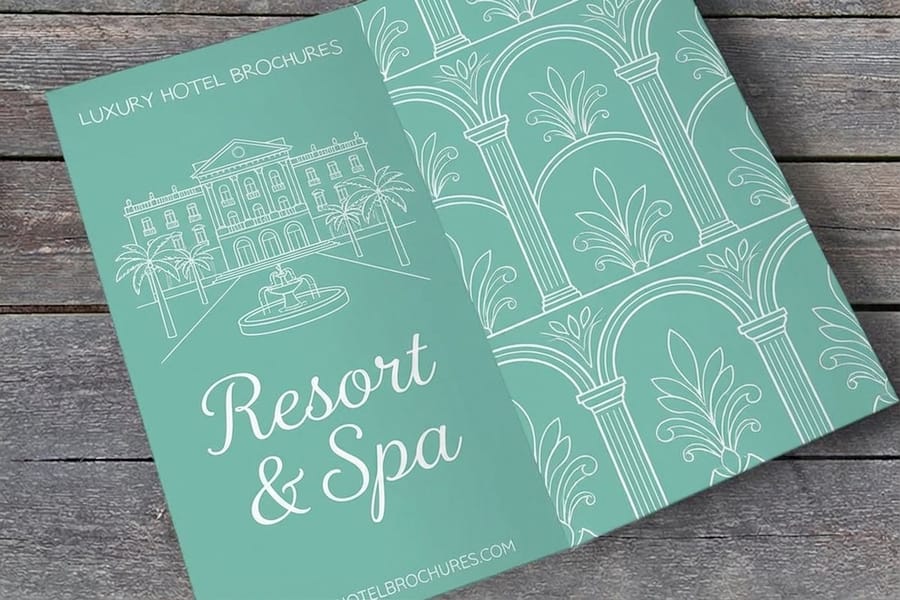 Hotel brochure printed by 4OVER4 showing full-bleed room photography across a panel