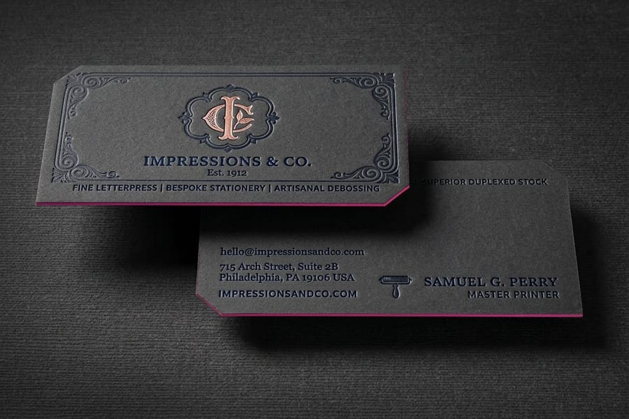 Letterpress business cards printed by 4OVER4 showing a pressed impression in thick stock