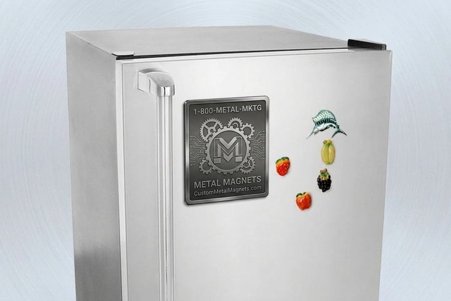 Premium metal magnet with a crisp engraved-look logo, printed by 4OVER4