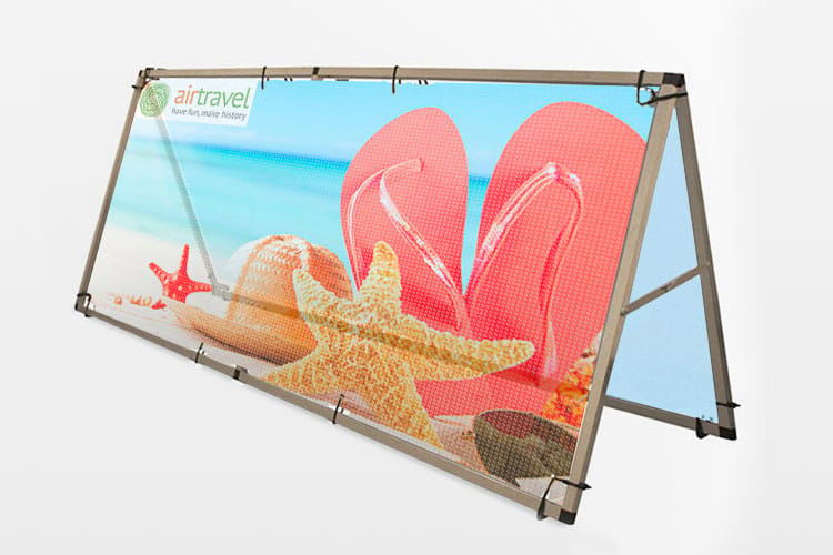 Close-up of a vividly printed banner showing color detail, produced by 4OVER4