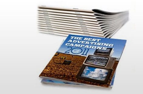 Inside spread of a corporate training program with session blocks and note space, printed by 4OVER4.COM