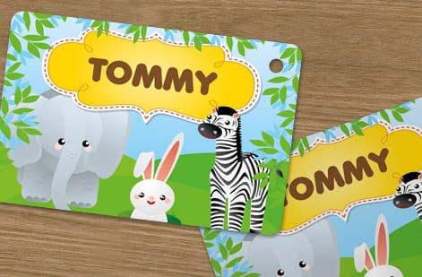 Hang tags in kraft, coated, and cover stock with cotton and jute strings, printed by 4OVER4