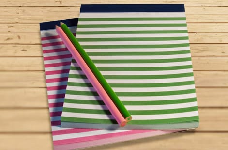 Desk notepads in 5 by 7 and 5.5 by 8.5 inch sizes printed by 4OVER4