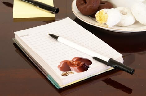 Magnetic notepads that stick to a fridge printed by 4OVER4