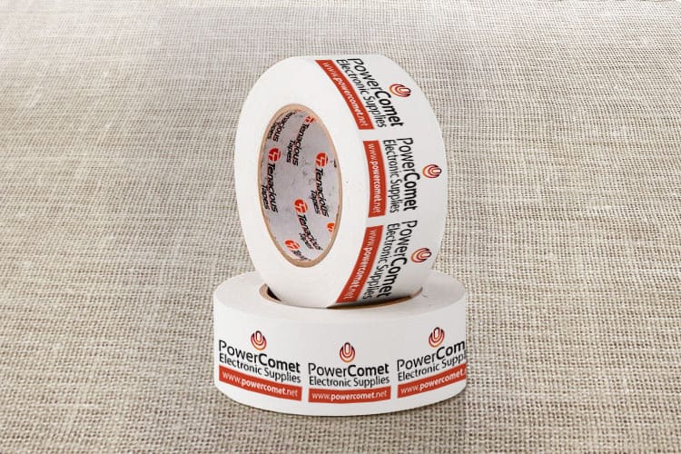 Custom packaging tape sealing a shipment, printed by 4OVER4