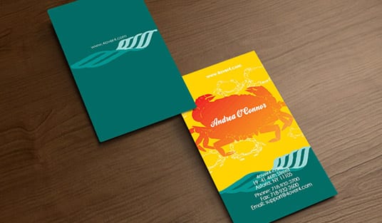 A business card layout being planned with logo and contact details, printed by 4OVER4