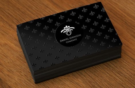 A business card file showing bleed, trim, and safe margin lines from 4OVER4