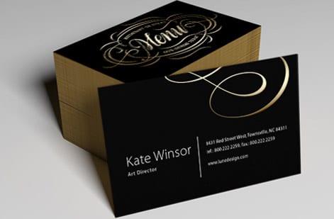 Home-printed cards next to professionally printed business cards from 4OVER4
